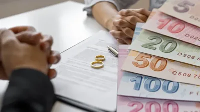 AYM, boşanılan eşle yaşayana gelir ve aylık kesintisini onadı